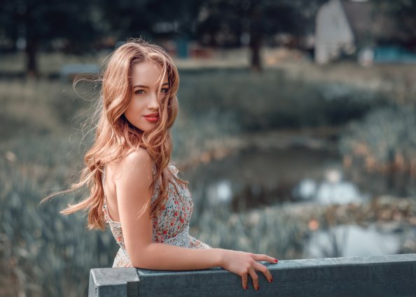 Girl Looking Back Sitting On Bench 4k