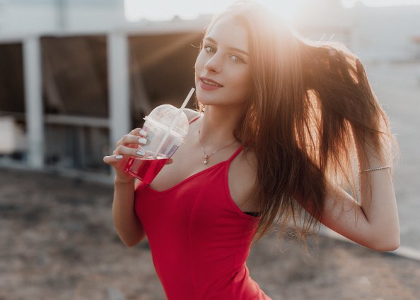 Girl Smiling Drink In Hands