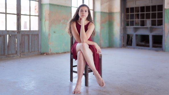 Ballerina Dancer Sitting On Chair 4k