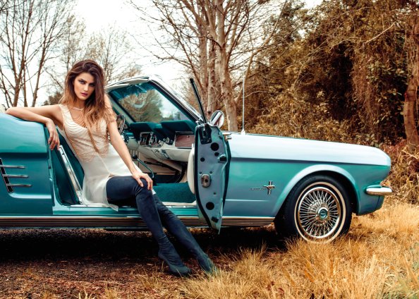 Model Sitting In Vintage Car