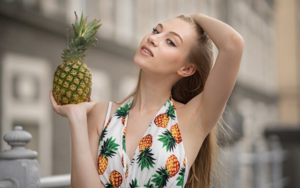 Girl Posing With Pineapple