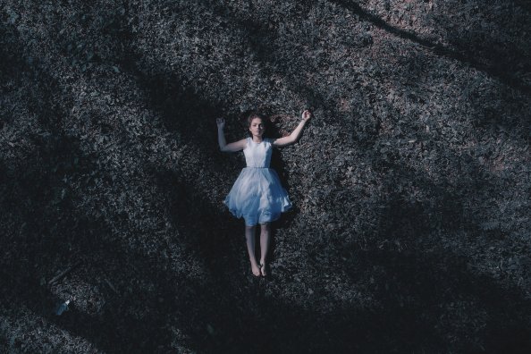 Girl Laying Down On Ground 5k