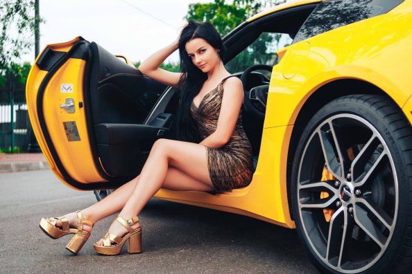 Gorgeous Girl Sitting In Sport Car