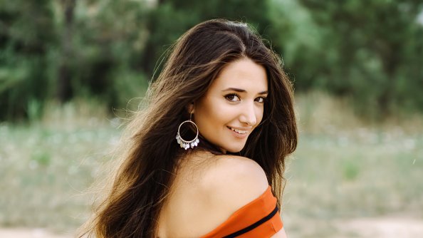 Andrea In Orange Dress Looking Back 4k