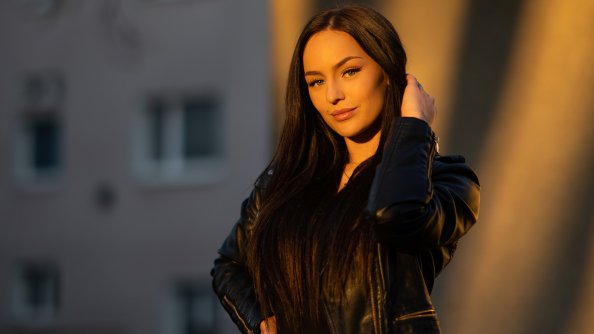 Girl Black Clothing Sun Rays On Face 4k