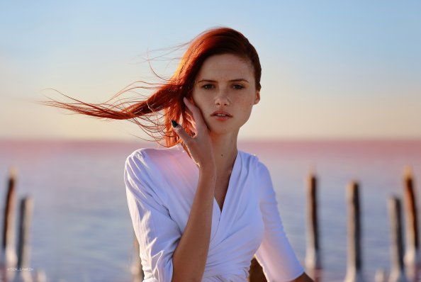 Redhead Model White Dress Looking At Viewer