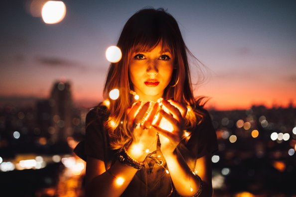 Girl Holding Fire Flies