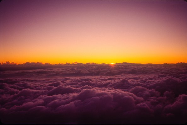 Sun Rises Over The Clouds From On Top Of Mount Fuji 5k