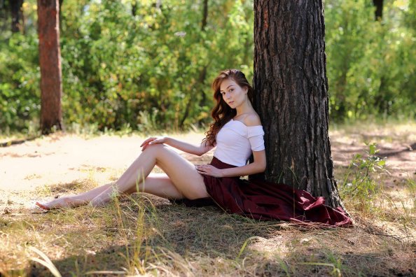 Women Sitting Under The Tree Outdoor