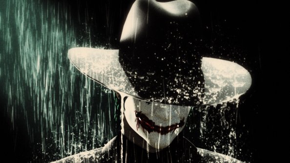 Joker In Rain Wearing Hat