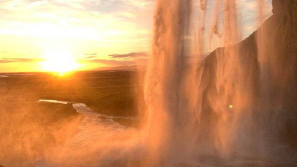 Sunset From Waterfall Behind