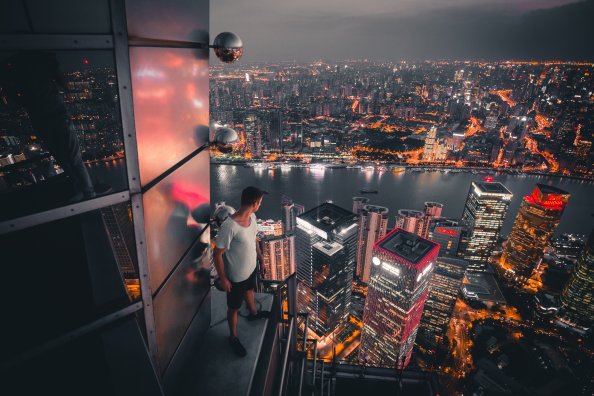 Boy Standing On The Rooftop Of Building Looking Down 5k