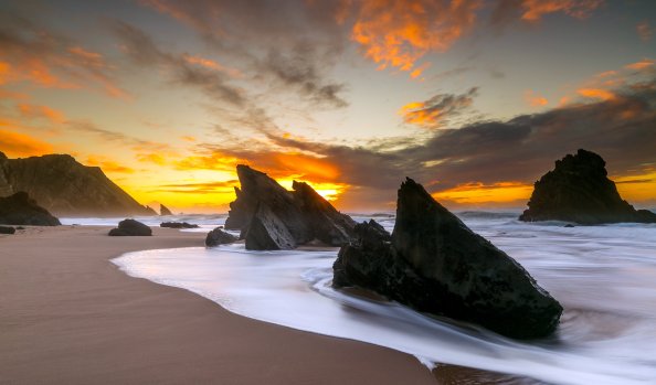 Large Rocks On Beach Shore