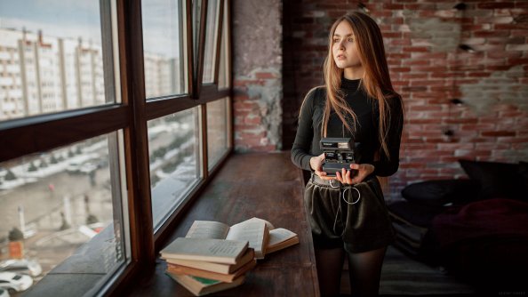 Girl With Retro Camera In Hand 4k