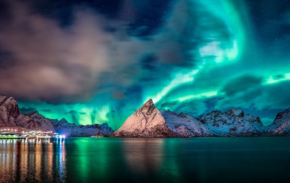 Aurora Reflection Over Mountains