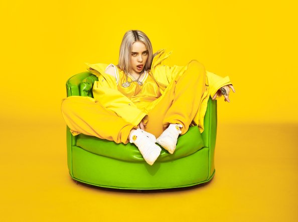 Billie Eilish Armchar Siting 5k