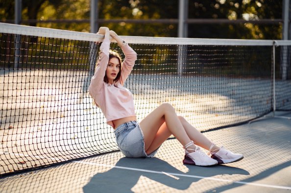 Girl In Tennis Court
