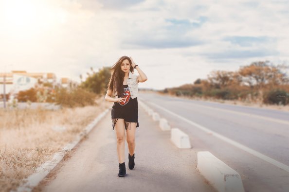 Girl Walking On Road