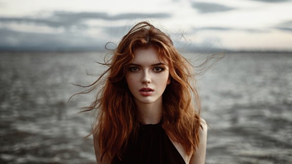 Redhead Model Wavy Hair Looking Directly