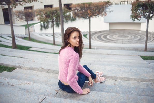 Beautiful Girl Sitting In Stairs