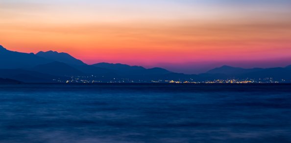 Sunset Over Mountains City