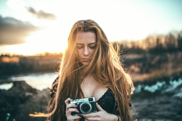 Girl Holding Camera