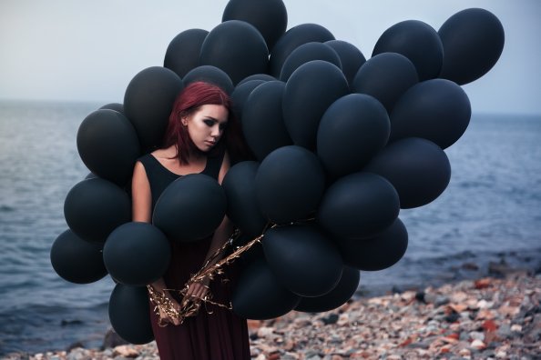 Girl With Black Ballons