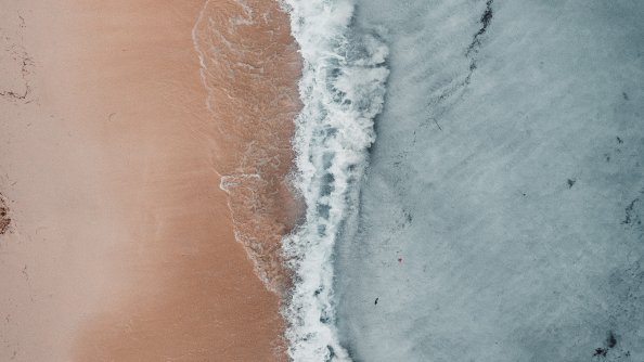 Aerial Beach Waves At Sea Shore