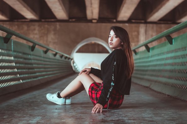 Girl Skirt Outfit Sitting Looking Back 4k