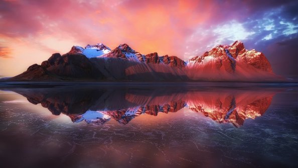 Reflection Of Mountains In Water
