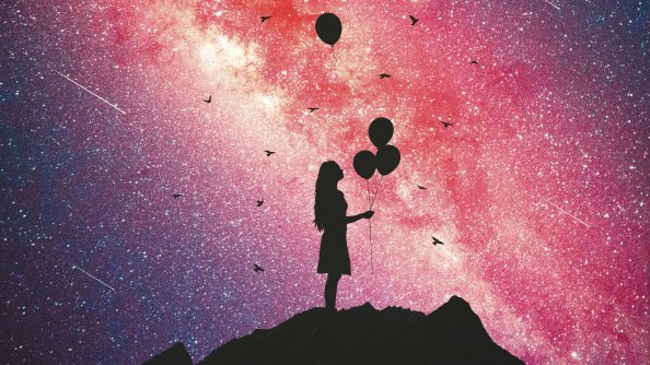 Girl Holding Balloons