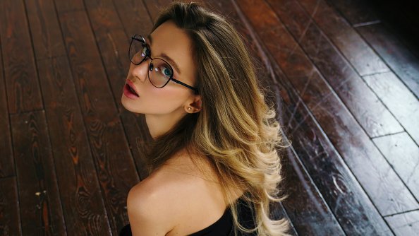 Girl In Glasses Looking Back