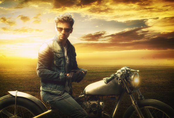 Man On A Motorbike At Sunset