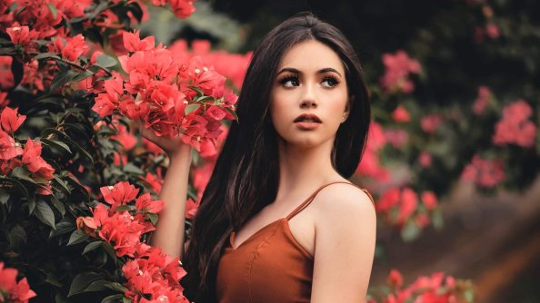 Girl Outdoors Posing With Flowers