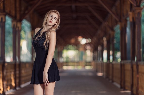 Blonde Girl In Black Dress
