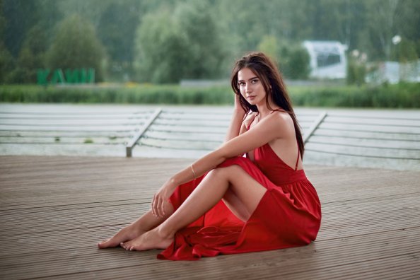 Girl Red Dress Smiling Sitting Outdoor