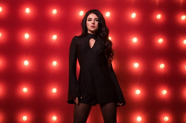 Girl In Black Dress Red Background