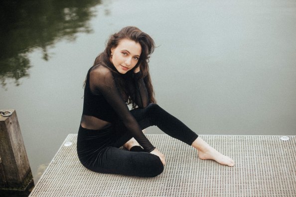 Girl Black Dress Pier Side