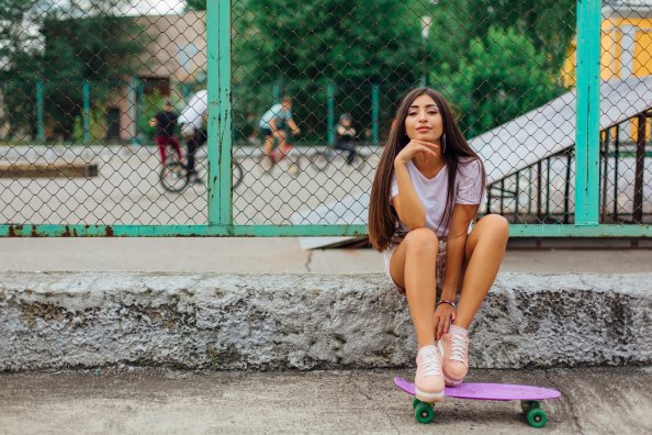Skateboard Girl Sitting Smiling Portrait