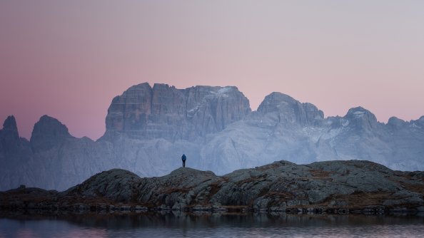 Standing On Top Over Rocks Mountains