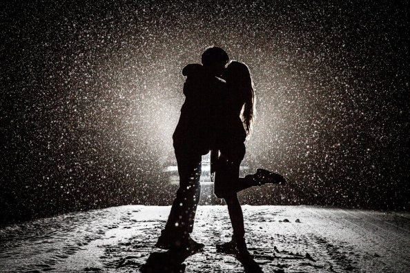 Couple Kissing in Snow