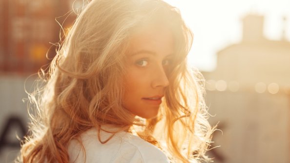 Girl Looking Back With Skateboard 4k