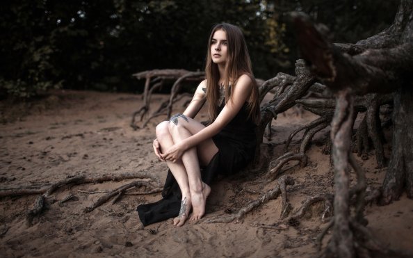 Beach Girl With Tattoo On Leg