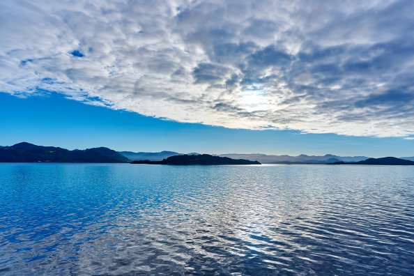 Vibrant Clouds Over Lake Seascape