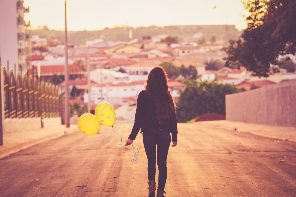 Girl With Balloon Walking Away