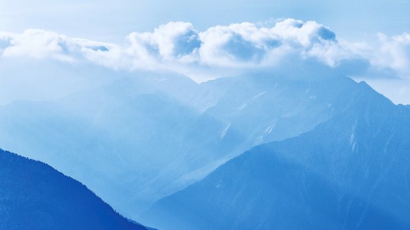 Silhouette Of Mountains Under Cloudy Sky 5k