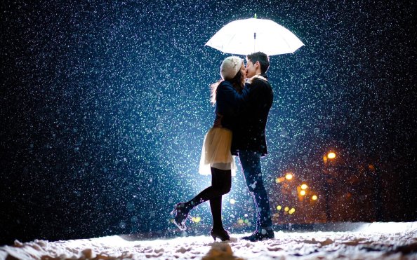 Couple Kiss In Snow